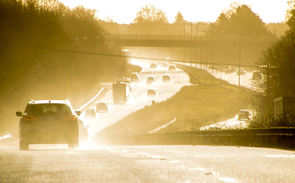 Image of a road flooded with sunshine