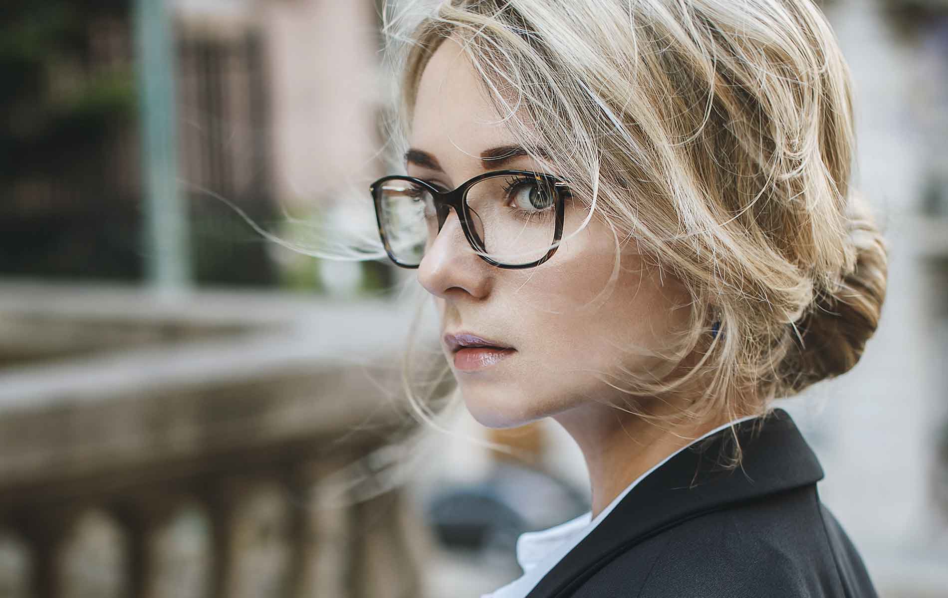 Close up of a girl wearing glasses. 