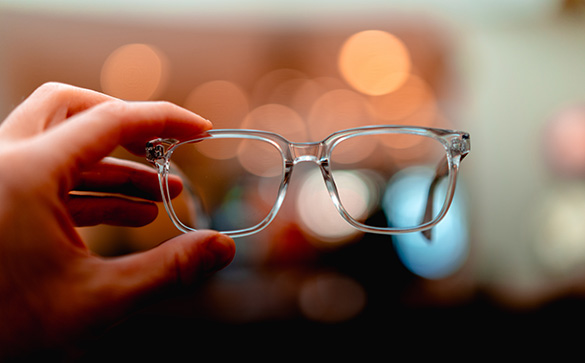 Hand holding glasses 