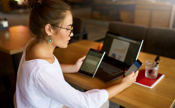 Woman using digital devices