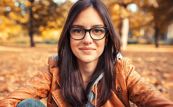 Close up of a girl wearing glasses. 