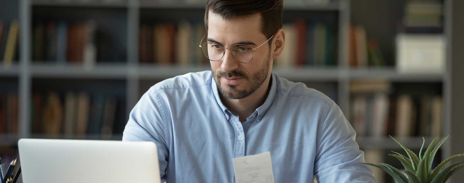 Man working on computer laptop